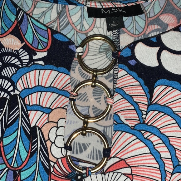 This multi print dress is made from 96% polyester and 4% spandex, super comfy! - Picture 2 of 3